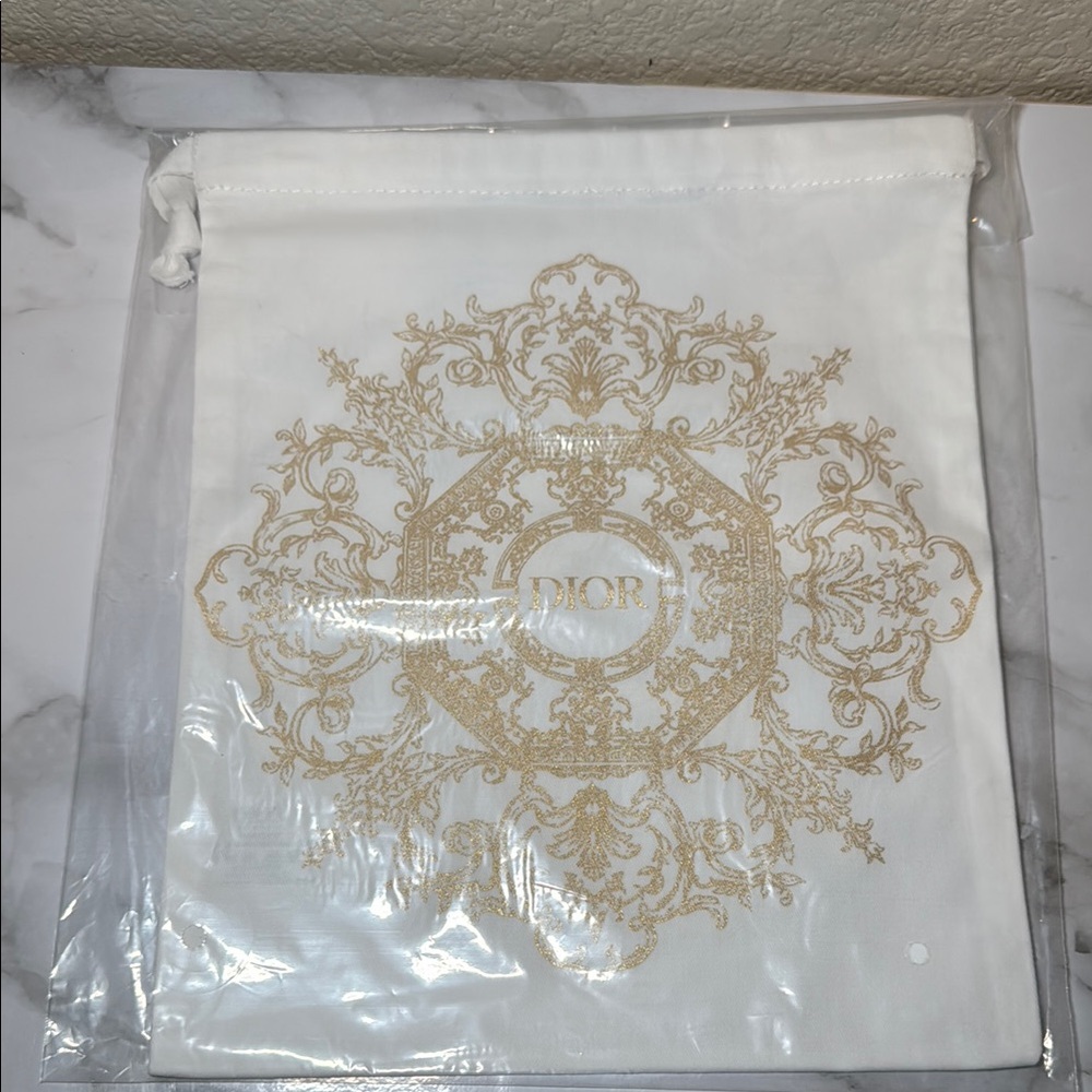 Dior White and Gold Drawstring Bag